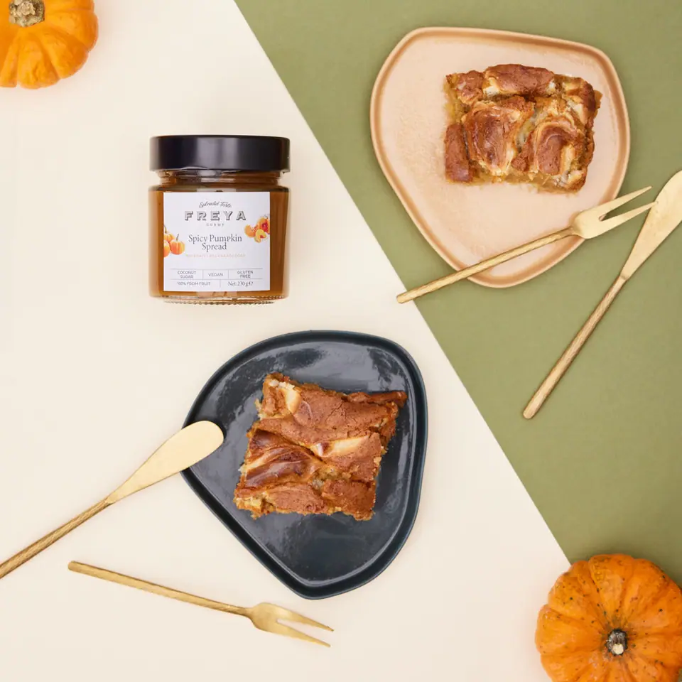 Spiced pumpkin cream cheese cake portions on small plates